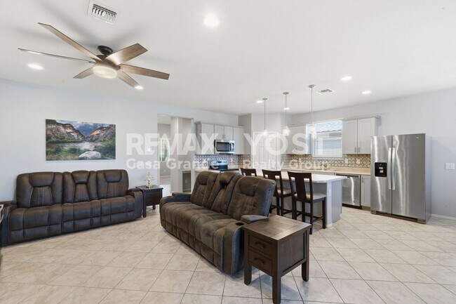 Building Photo - Move-In Ready Desert Gem with Stylish Furnishings & Private Backyard!