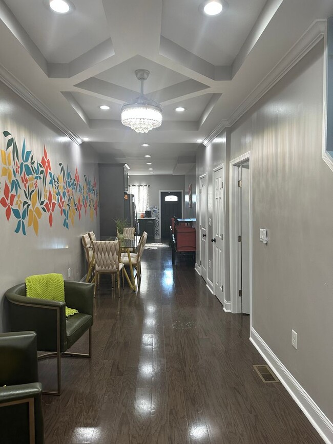 Building Photo - Fully Furnished! Spacious Rooms! Modern Decor! Finished Basement! Central Air! Fireplaces! Availa...