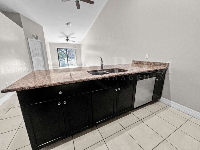Building Photo - 3BR/2BA Cape Coral Rental - Washer... Dryer... Screened Lanai... This One Came Prepared