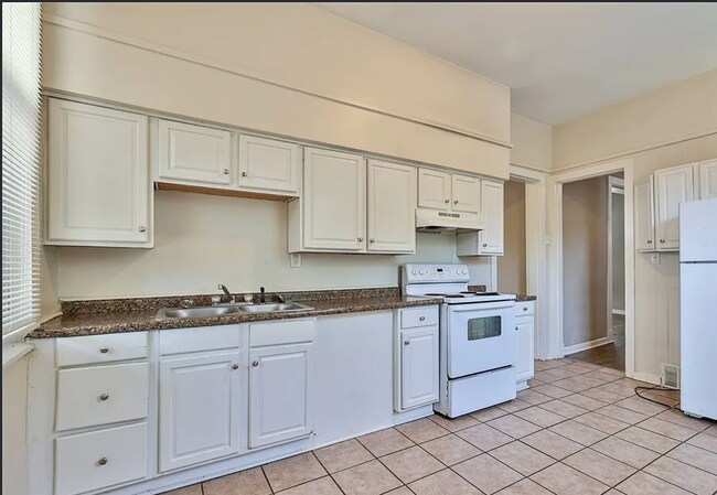 Building Photo - Bright 4-Bed Home with Fenced Yard, Central HVAC, and 3 Finished Levels