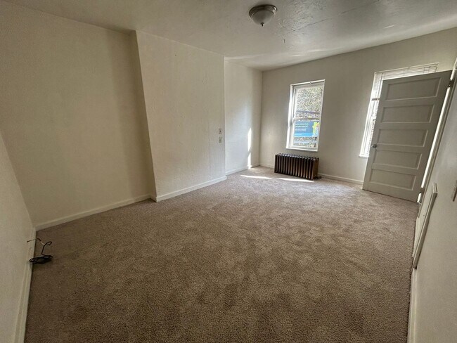 Building Photo - Super Spacious Three Bedroom on Bates Street! Deck & Patio! Washer & Dryer Included! Call Today!