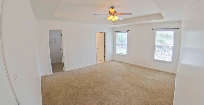 Building Photo - HUGE Backyard + Amazing Patio + Pet Friend...