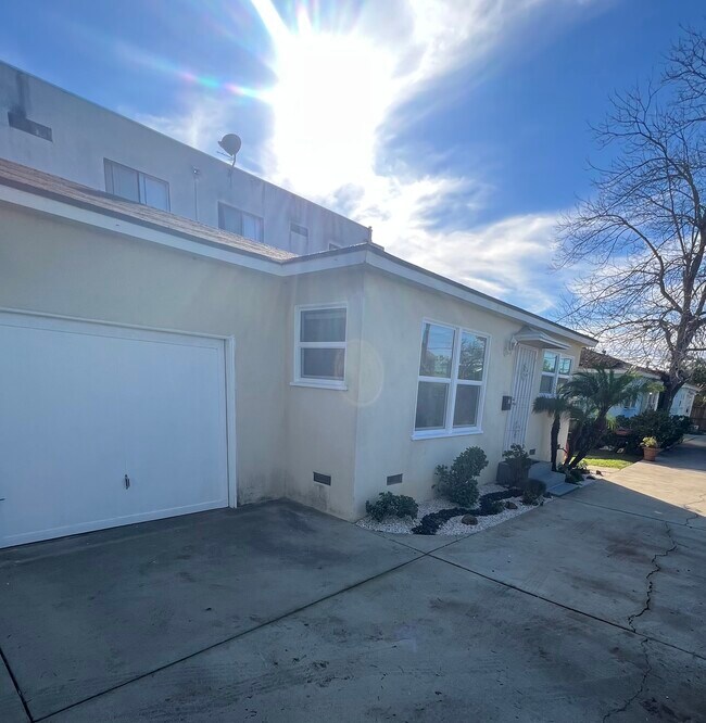 Attached one car garage/Front entry - 940 N Cedar St