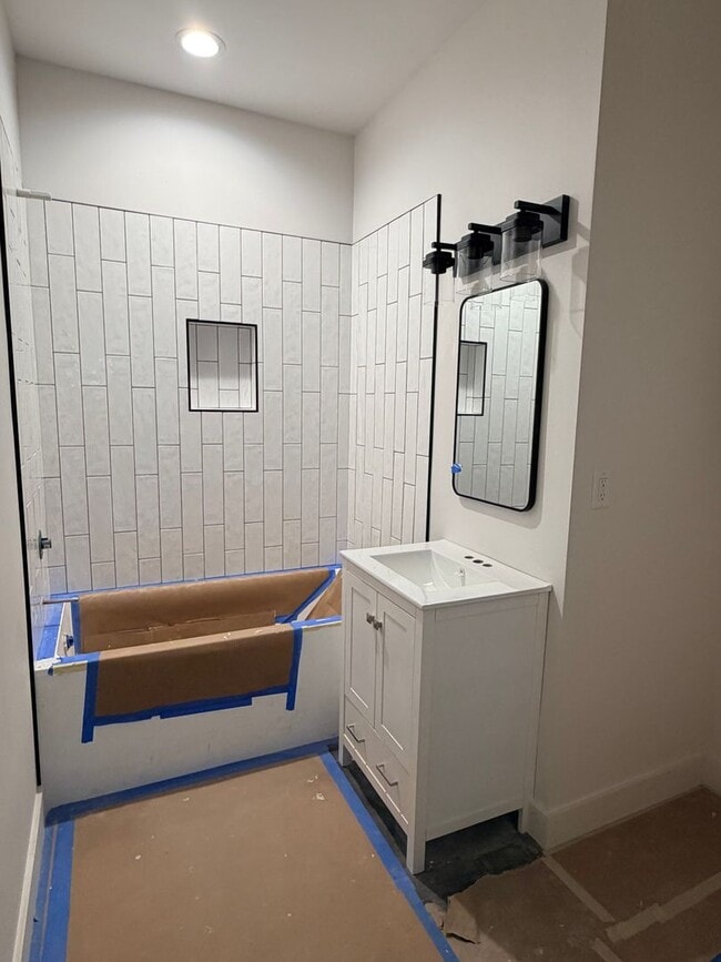 Building Photo - COMING SOON! Brand new 2 bed/2 bath, central a/c, dishwasher, washer & dryer, deck & patio!