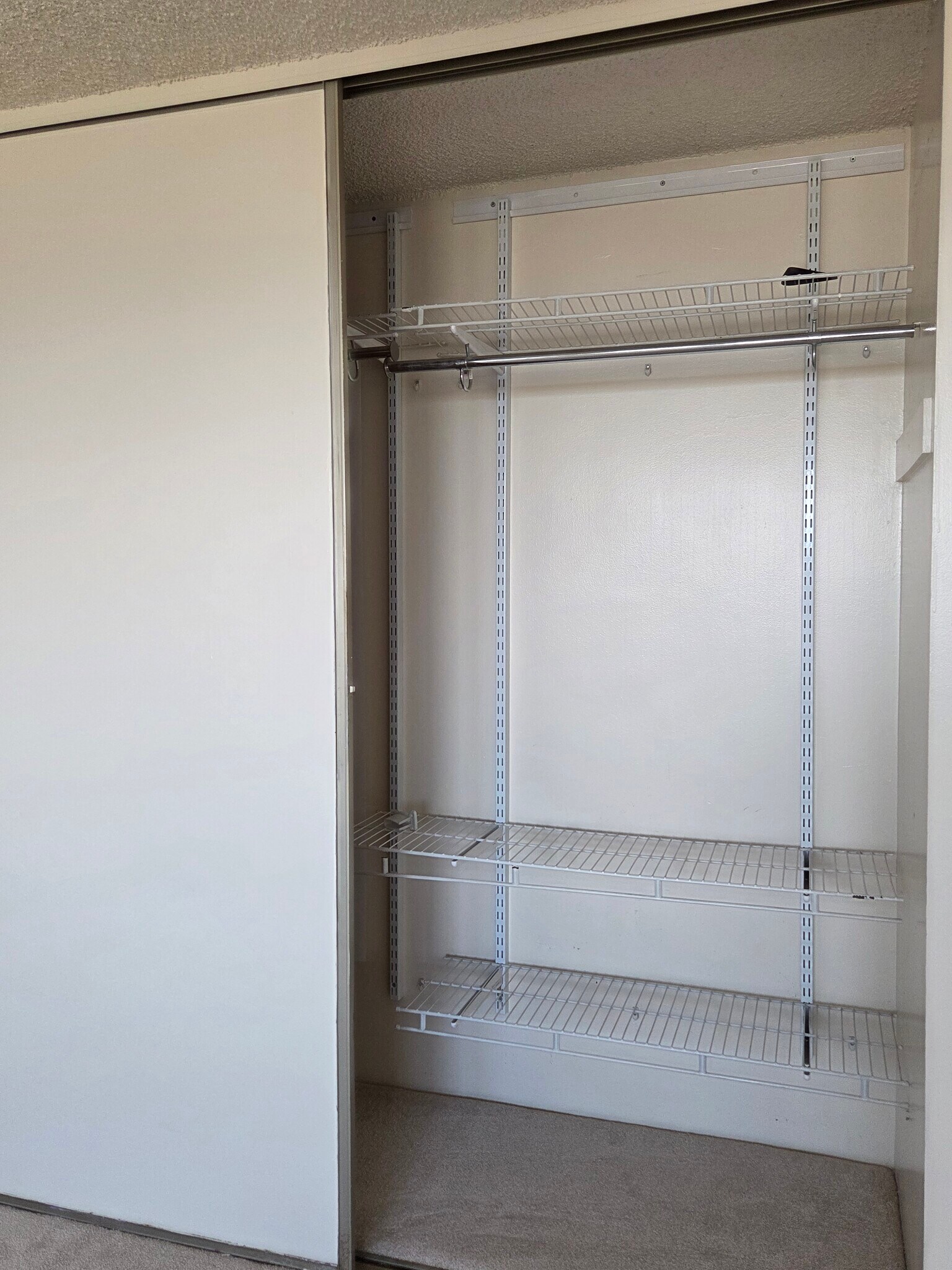 Master Bedroom Closet with shelving system - 98-288 Kaonohi St
