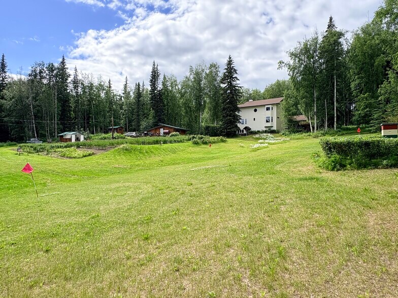 View of House from field - 108 Wilderness Dr
