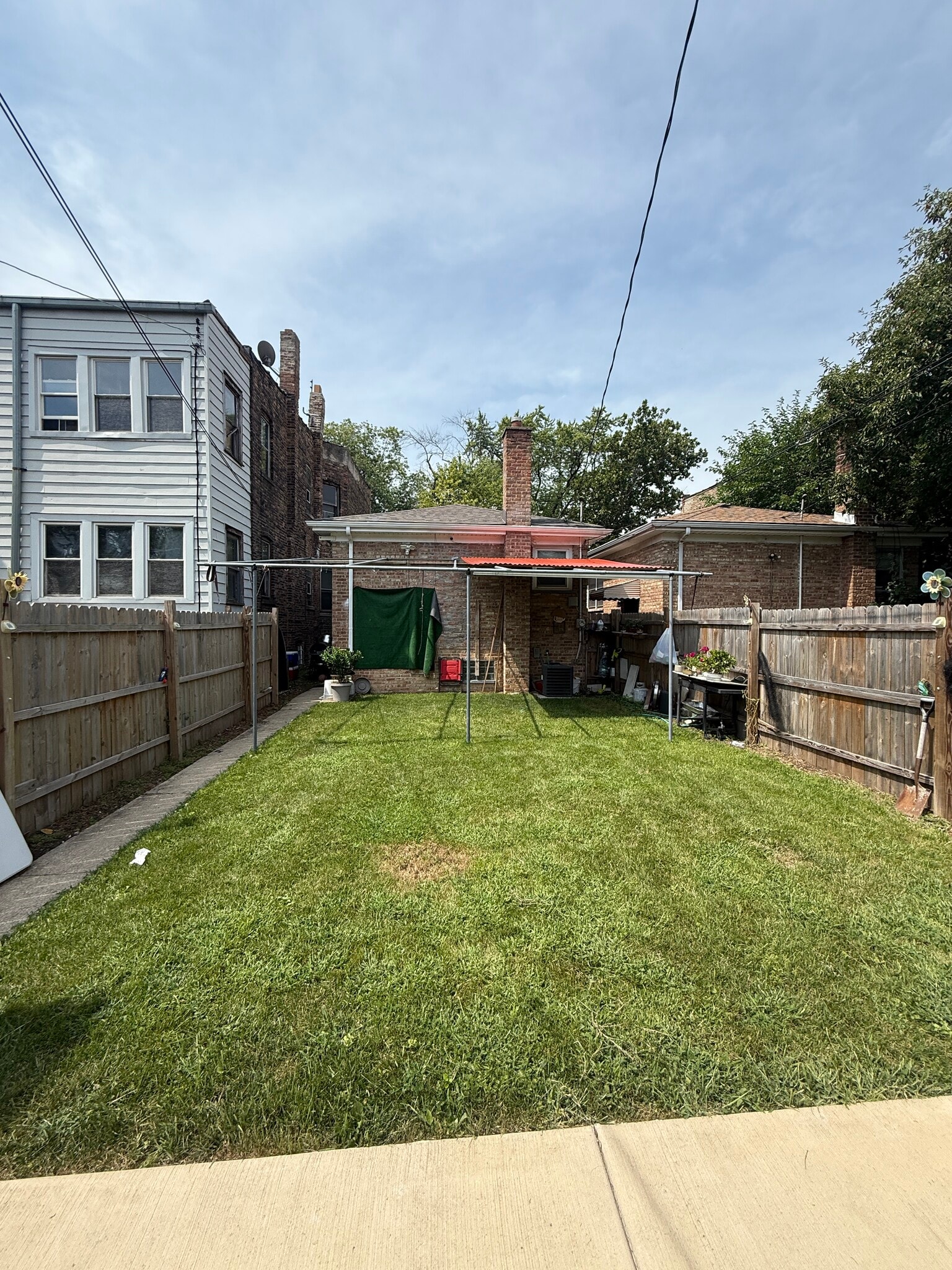 Current backyard, structure will be removed on move out - 1019 N Springfield Ave