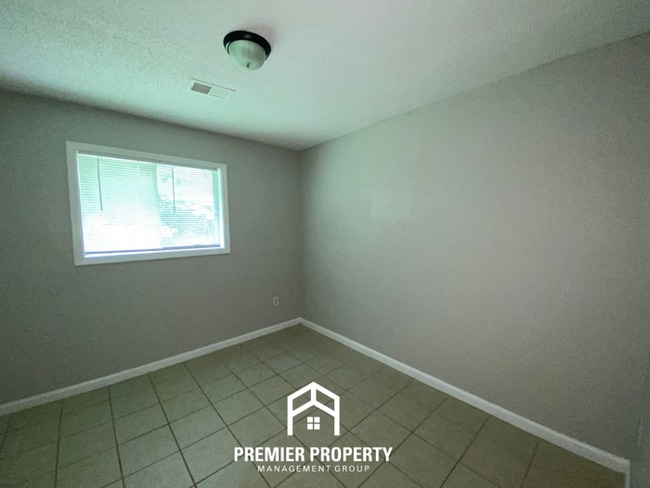 Building Photo - Spacious 4BR Family Home in Raleigh | Modern Tile Floors & Spacious Backyard