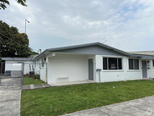 Building Photo - 3296 NW 13th Ter