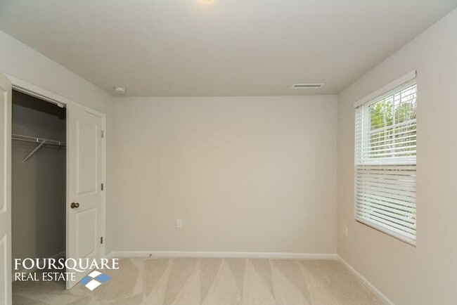 Building Photo - Modern 3-Story Townhome with First-Level Bedroom, Open Floor Plan & Community Pool – Prime RTP Lo...