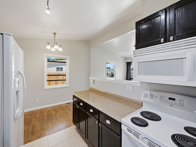 Building Photo - Updated 3 Bed Home with Vaulted Ceilings, Solar Panels & Large Corner Lot- $200 Lease Sign On Bonus!