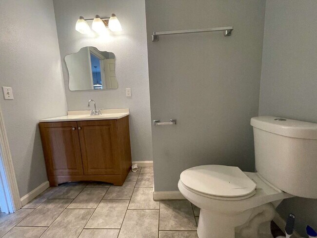 Building Photo - Open floor plan, four-bedroom two-bathroom with washer and dryer