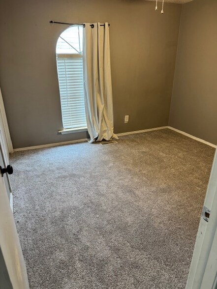 Bedroom 3 near Garage Entry - 704 N Dryden Cir