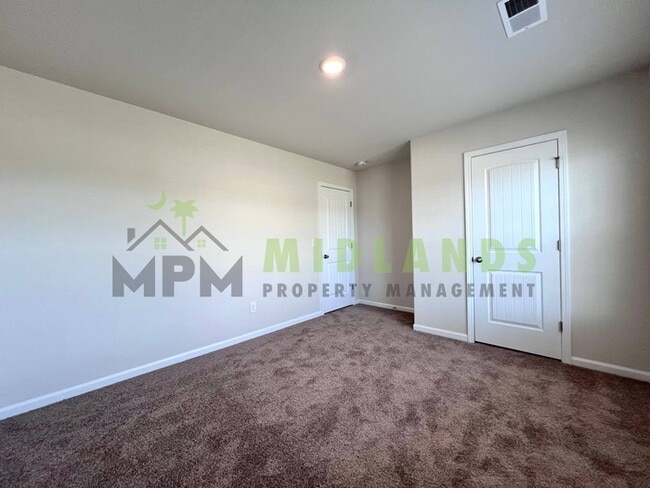 Building Photo - 645 Wild Tulip Ct