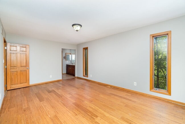 Building Photo - Stunning 4-Bedroom Home with 5 Full Baths + Hot Tub, Wooded Retreat