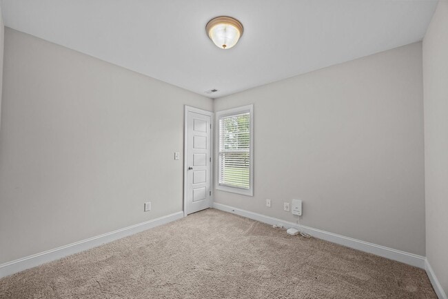 Building Photo - Three-bedroom, two-bathroom home located i...