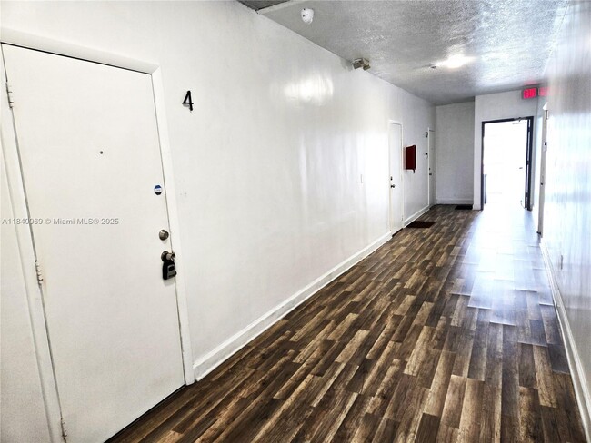 Building Photo - 384 Tamiami Canal Rd