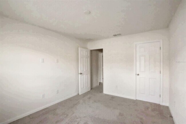 Building Photo - 1688 Tropical Palms Cir