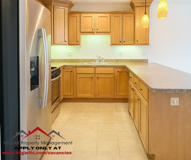 Building Photo - Updated and well-maintained, this 2-bedroo...