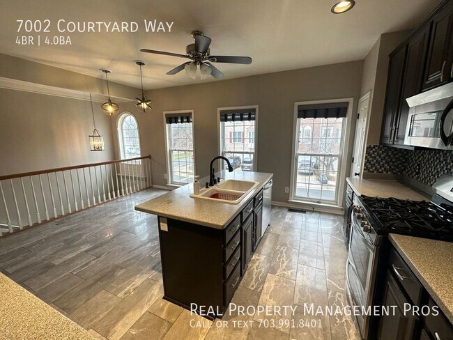Building Photo - 7002 Courtyard Way