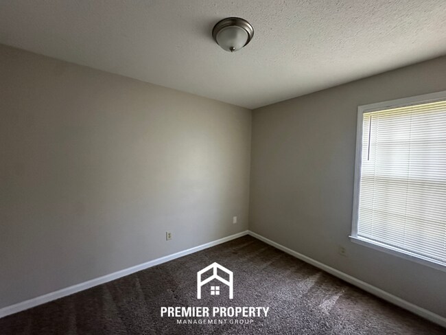 Building Photo - Gorgeous 4BR/2BA Bartlett Home with Brick Fireplace & Spacious Fenced Yard!