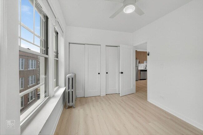 Building Photo - 6975 N Bell Ave