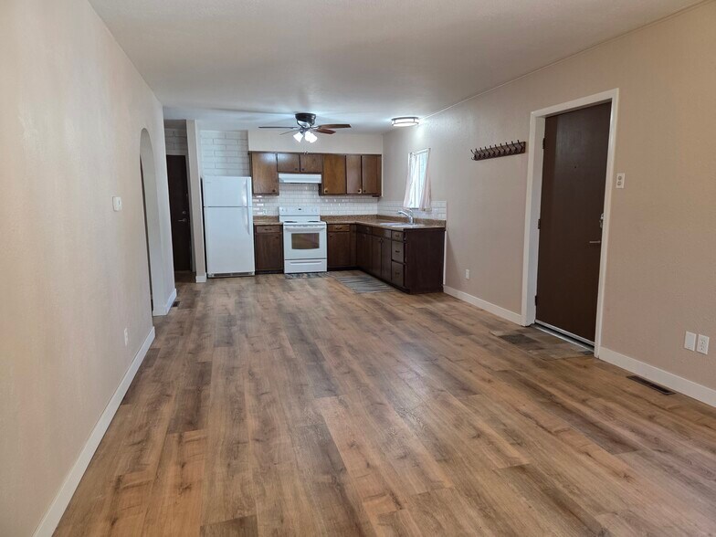 Open floor plan with kitchen, dining and living room - 610 N Orchard Ave
