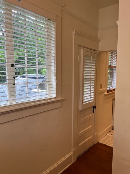 Rear entry door; Kitchen beyond - 18 Avery Dr NE