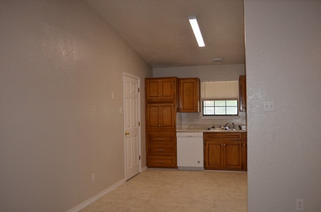 Building Photo - This 3 Bedroom Home with Fireplace is a must see!