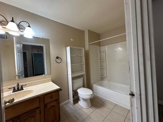 Building Photo - Welcome to this charming 3-bedroom, 2-bathroom home located in Atkins, AR