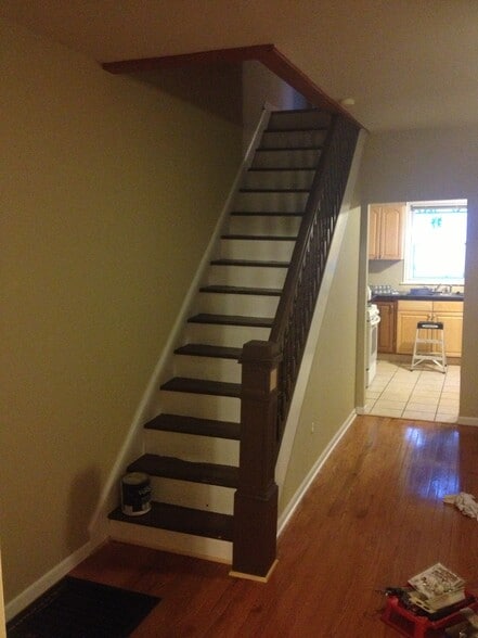 Dining room staircase looking into kitchn - 419 E Lane Ave