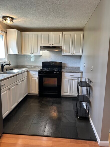 Slote floors in the kitchen - 1082H Mount Hope Ave