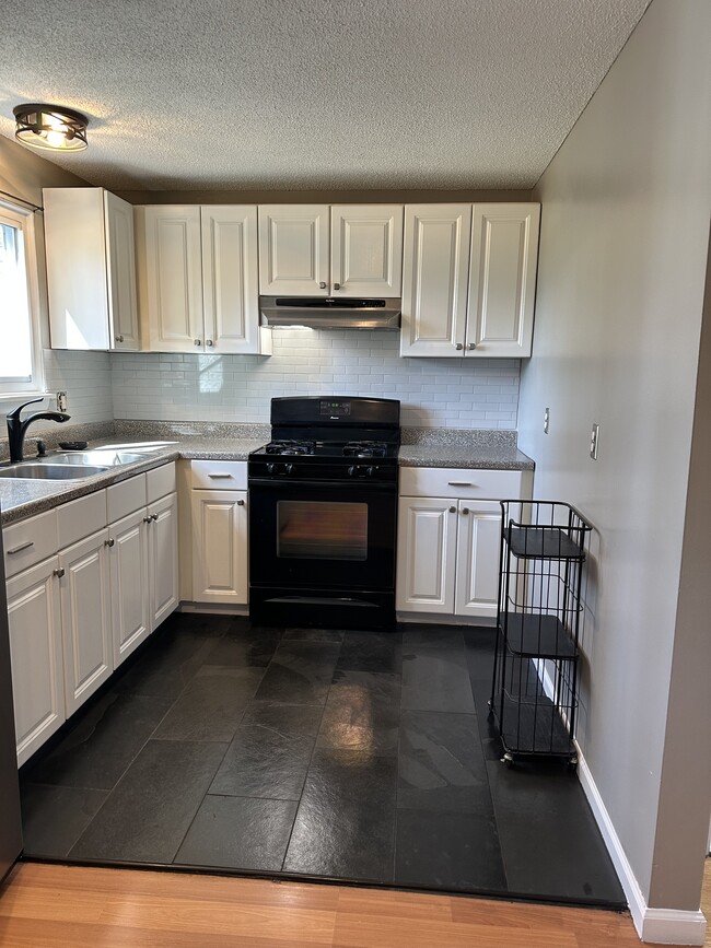 Slote floors in the kitchen - 1082H Mount Hope Ave