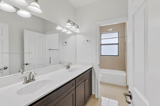 Building Photo - 8725 NW 102nd Ct