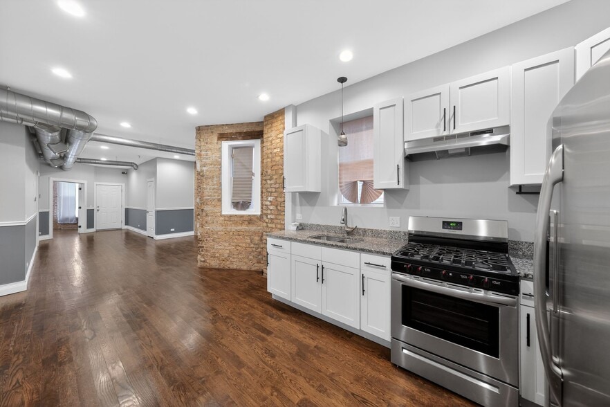 Building Photo - 7038 S Eberhart Ave