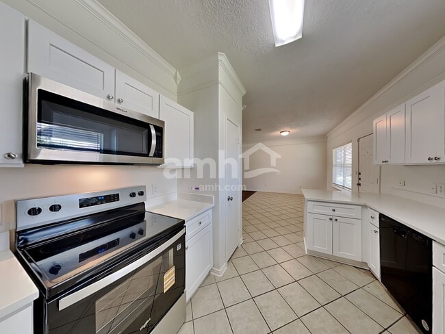 Building Photo - 9116 Dolphin Cir