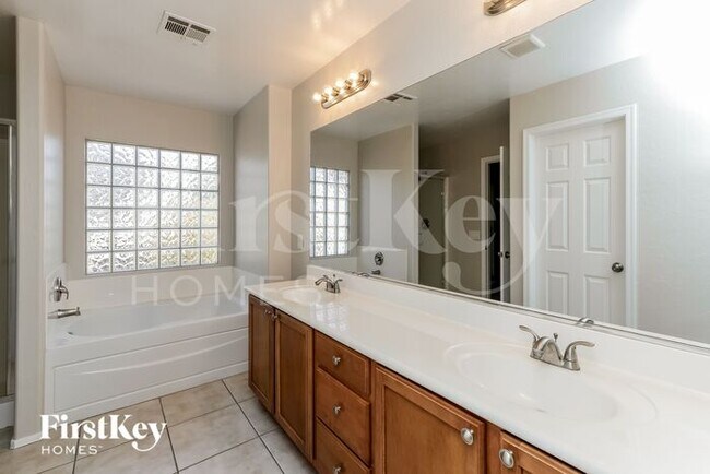 Building Photo - 10726 Arusha Ave