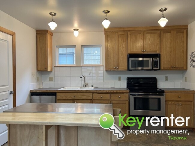Building Photo - Discover Your Perfect Home: Modern Comfort...