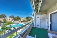 Building Photo - Gated 2BR Condo with Pool View