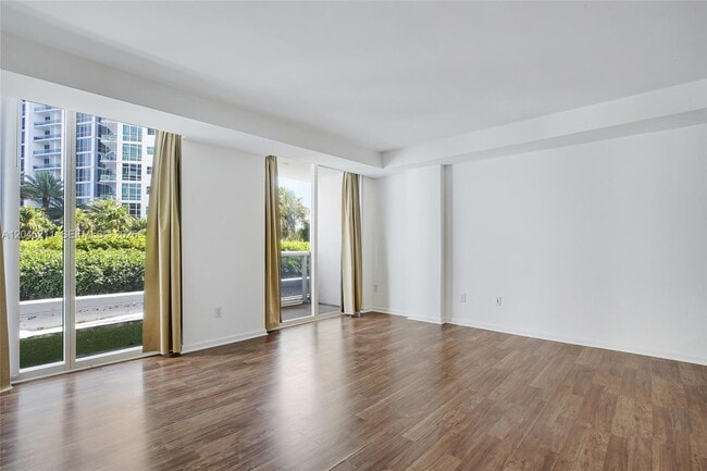 Building Photo - 10275 Collins Ave