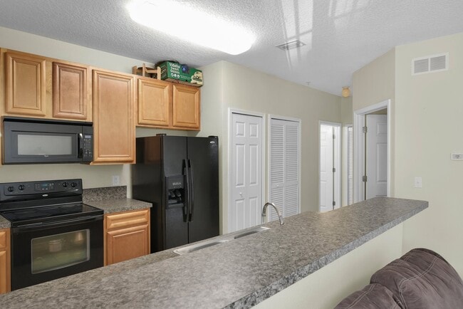 Building Photo - 8241 Pelican Landing Rd