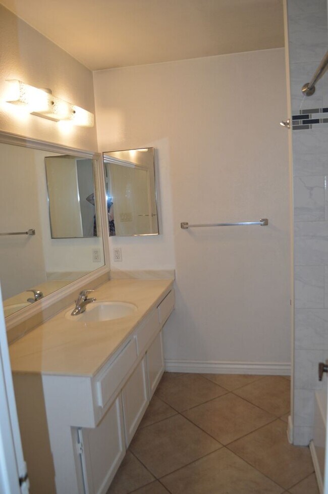 Building Photo - Four Bedroom, Two Bathroom Single Story Home With Two Car Garage