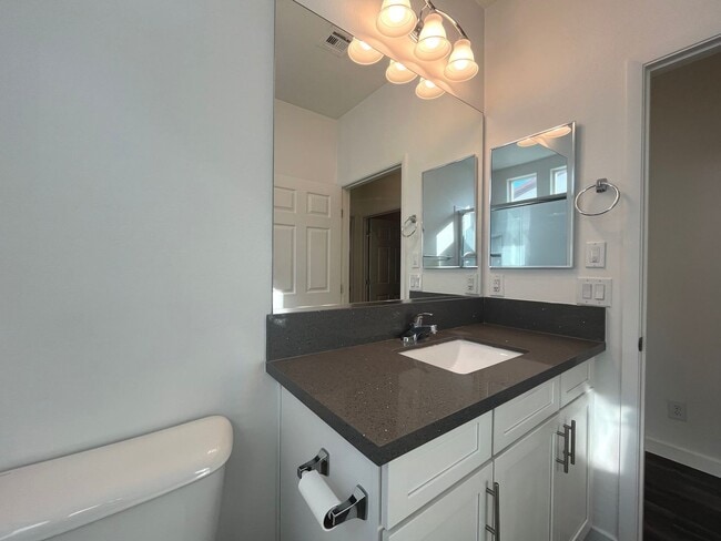 Building Photo - Single-story 1326 sq ft, townhome built in 2019 w/3 bed, 2 bath & spacious attached 2-car garage ...