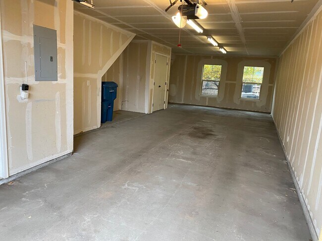 Building Photo - Large garage with attached spacious 2 bedroom townhome