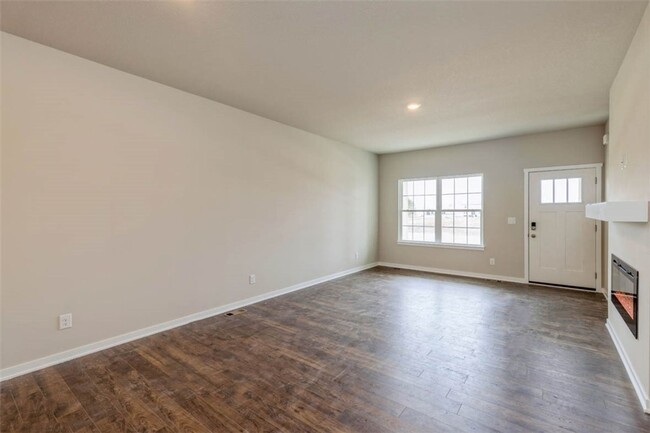 Building Photo - "Charming 2-Bedroom Home in Exclusive 36 W...