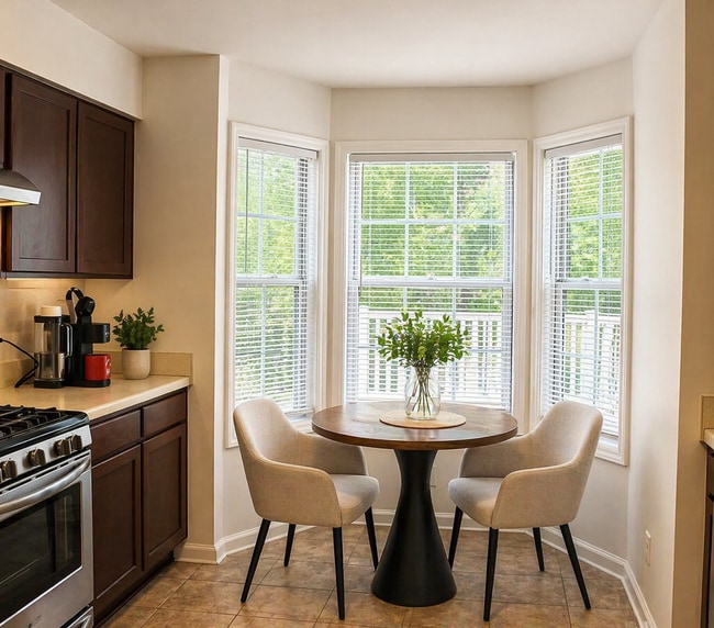 Building Photo - Charming 2-Bedroom Condo in a Peaceful, Tree-Lined Community – Minutes from Uptown Charlotte