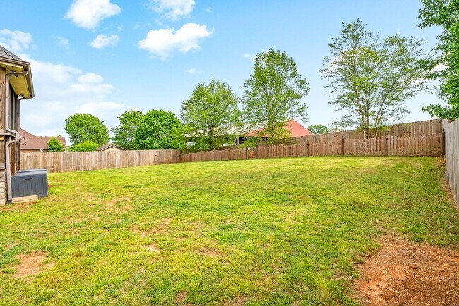 Building Photo - Spacious 4-Bedroom Home with Dual Living A...