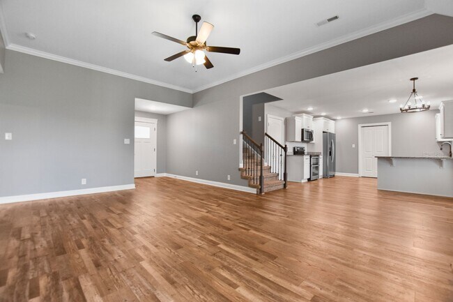 Building Photo - Pet Friendly Three Bedroom with Bonus!