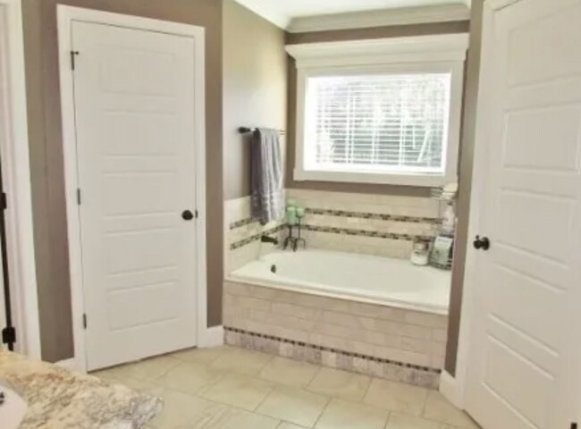 Building Photo - Spacious 4-Bedroom Home with Modern Upgrad...