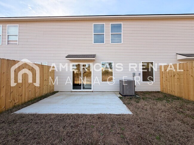 Building Photo - Spacious Two-Story Townhome with Open Layout!